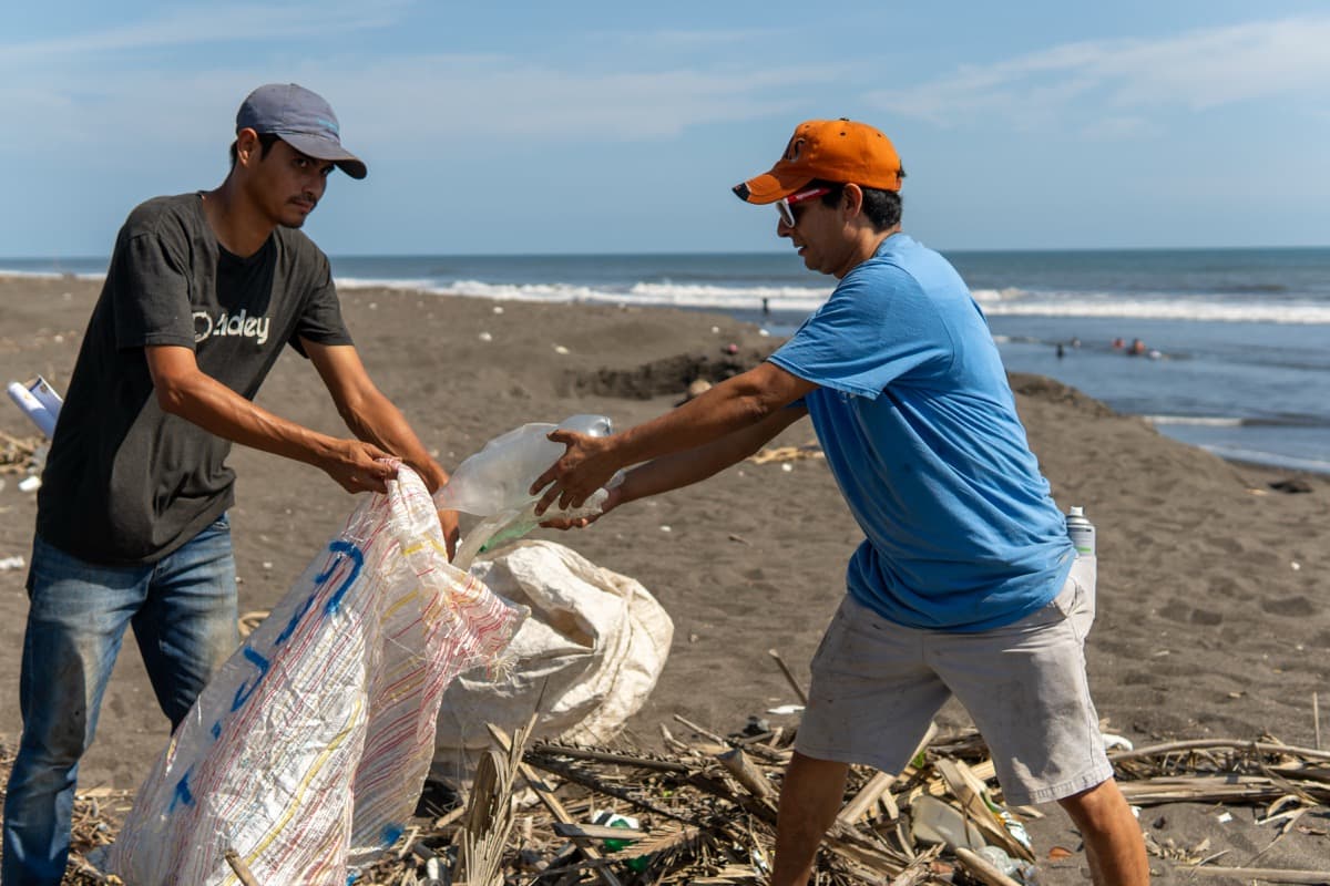 Tidey Ocean volunteers working together on beach cleanup